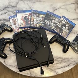 *Like-new condition* PS4 Slim 1TB Full Mem Storage w/ 4 Controllers + Games & All Wiring