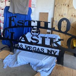 STEEL SIGN.  CLASSIC STYLE LAS. VEGAS NV  ESTILO CLASIKO LAS VEGAS NV  8 feet 9 3/4 Inches  45 1/2 Inches  $285.oo