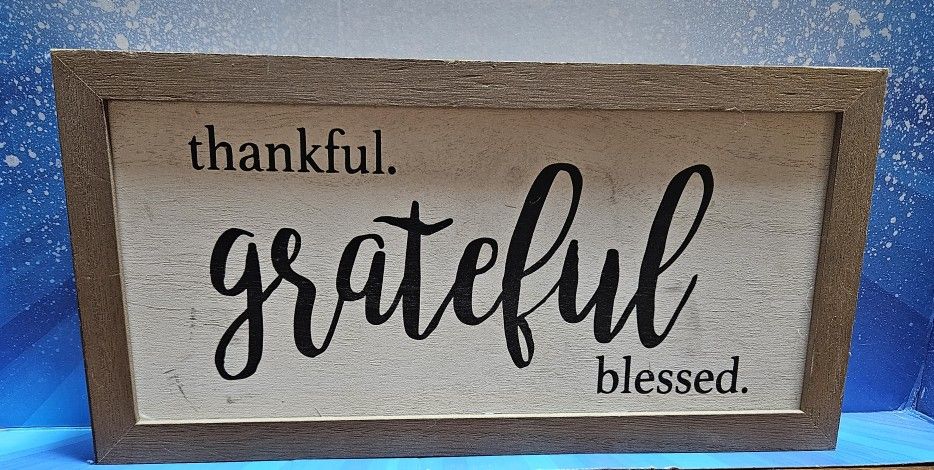 Decorative Distressed wall art with 'Thankful Grateful Blessed' text. Features a wooden frame.