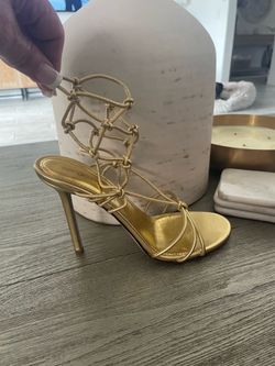 Sergio Rossi gold caged strappy stiletto sandals.