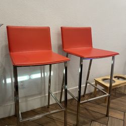 CB2 Orange Leather Bar Stools