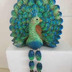 Peacock Sitter 