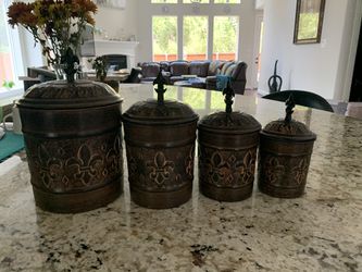 Canisters set in good condition ( used)