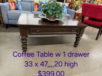 Dark Wood Coffee Table w Drawer We are located at 2811 East Bell road. Another Time Around Furniture.