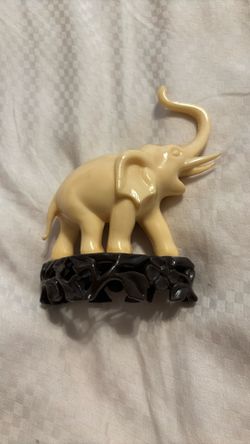 Elephant Figurine On A Stand
