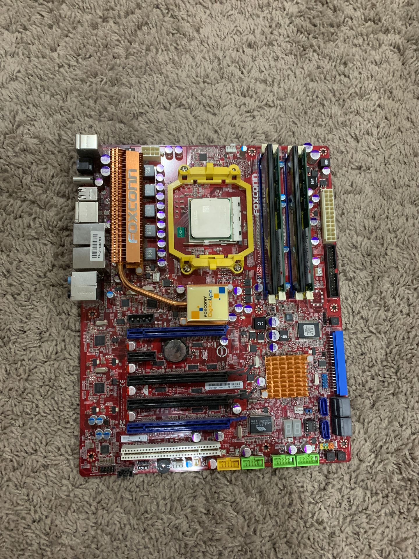 Motherboard with 8GB ram and Phenom quad core chip