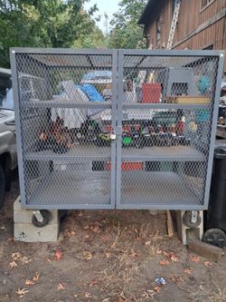 Steel Mesh Security Cart Truck. Box is 5'1"wide 4'1" high 3'2"deep + handle and wheels. Pick up fremont sea.