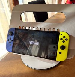 Nintendo switch OLED W Yellow and blue joycons