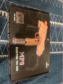 TOY GUN- mp9 electric toy gun NEW