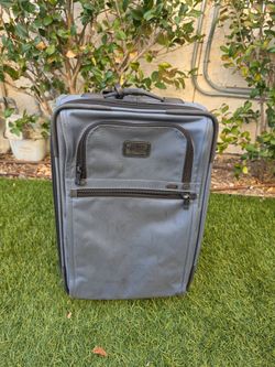 TUMI carry on luggage
