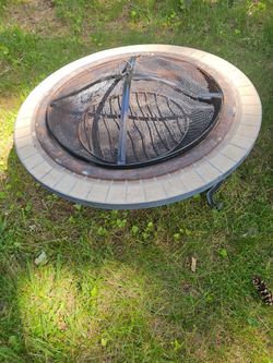 The price is firm..Beautiful tile top wood burning fire pit