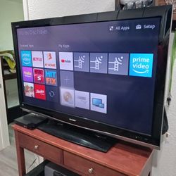 Sharp AQUOS  tv. 55 inches. Not a Smart tv, but it comes with a SONY  Roku  tv system. Good Condition.  so, you can   using it like a Smart tv.