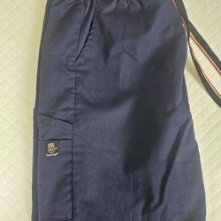 Navy blue cargo scrub pants from the brand Dress A Med