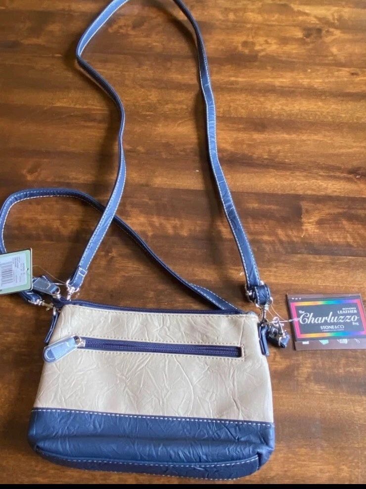 NWT Leather Versatile Post. Navy And Beige