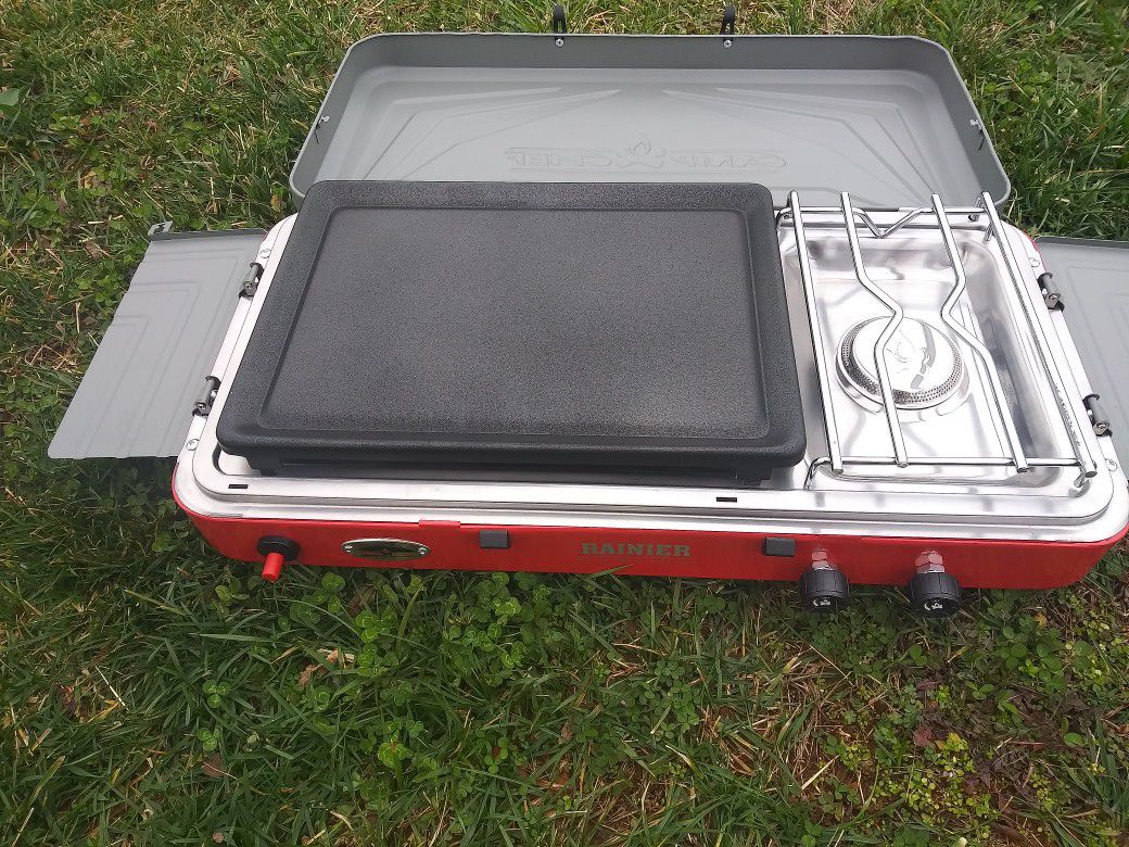 Brand new camping stove with storage bag