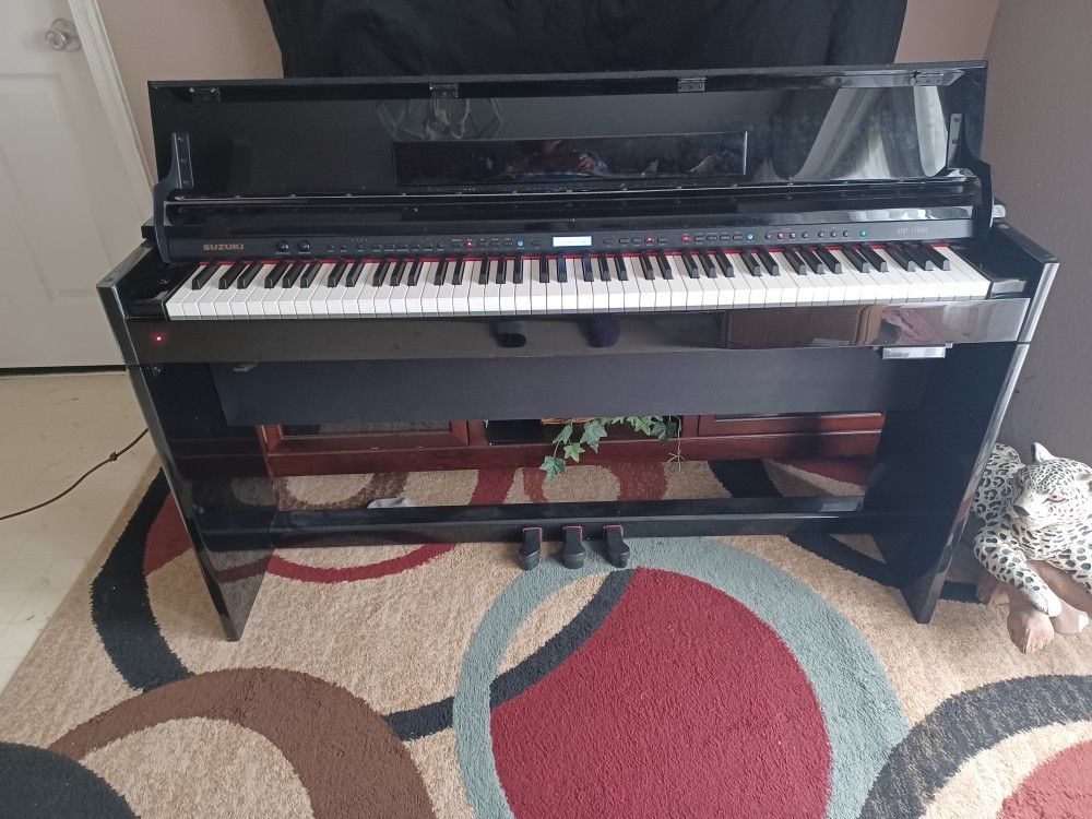 Beautiful Black Digital Suzuki DP-100 Piano For Sale In Loxahatchee FL.