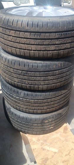 Set of 4 Tires with Silver Alloy Wheels