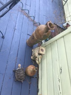 Outdoor concrete pots , elephant and a turtle