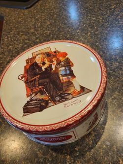 Norman Rockwell Metal tin