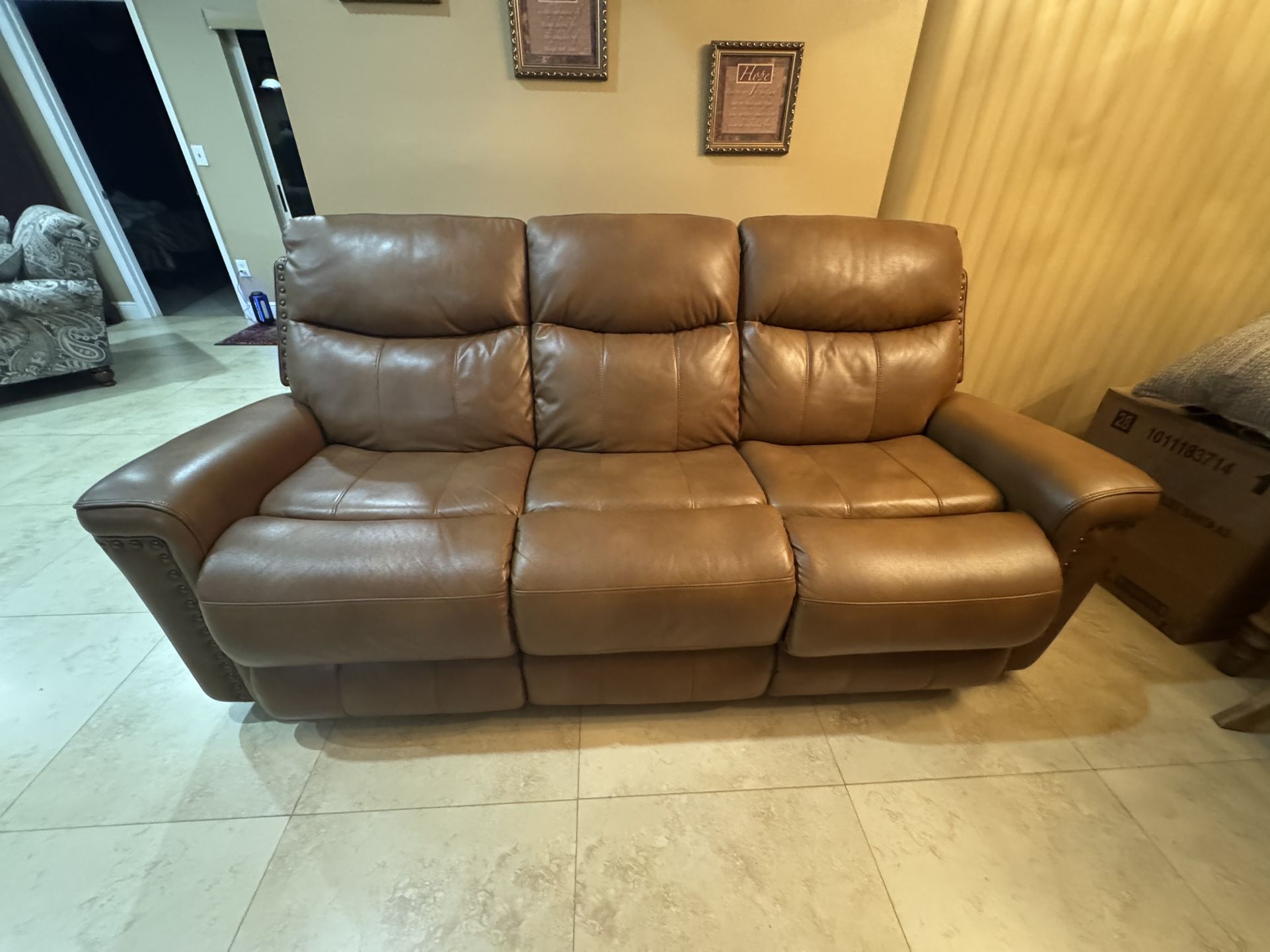 Living room couch With recliner & Phone Charger.