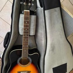 Washburn brand Auditorium / Concert cutaway acoustic electric guitar used.. Like New