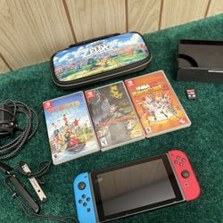 Nintendo Switch OLED Edition With Games & Case
