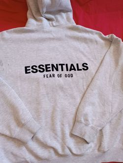 Fear of God Essentials Fleece Hoodie in the Light Oatmeal / Heather Grey colorway