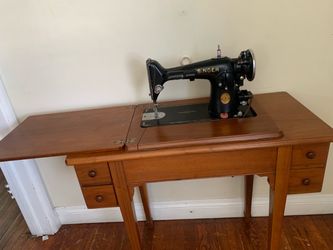 Vintage Singer Sewing Machine  model 201-2”  with cabinet in good working  condition .