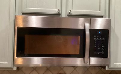 Free Samsung over the range 1.7 cu microwave