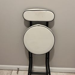 White portable folding stool