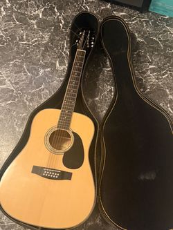 12 string guitar really good condition hard case