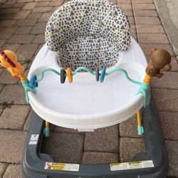 Baby Trend walker with interactive toys.
