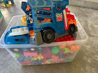 Plastic building blocks and trucks