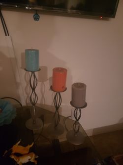Candle stand with candle.