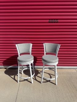 White and gray barstools