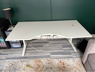 Adjustable height desk