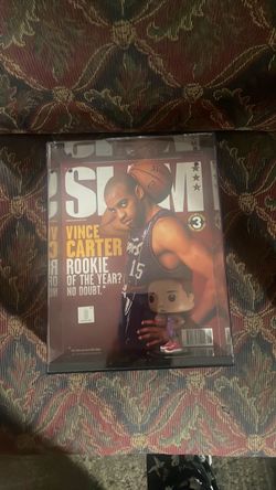Vince Carter funko pop and rookie magazine cover