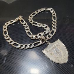 .925 thick silver necklace w/raiders pendant