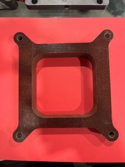 Insulating carburetor spacer