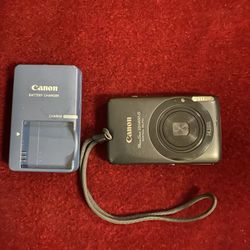 Canon PowerShot  SD1400 IS  14.1  MP Digital Camera