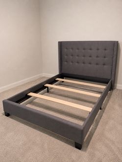 Gray Upholstered Bed Frame with Tufted Headboard