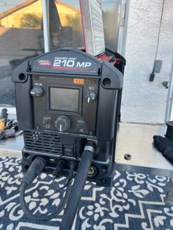 Lincoln Electric  Power Mig 210