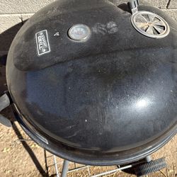 Barbecue  Grill; lawn mower  & Glass top table