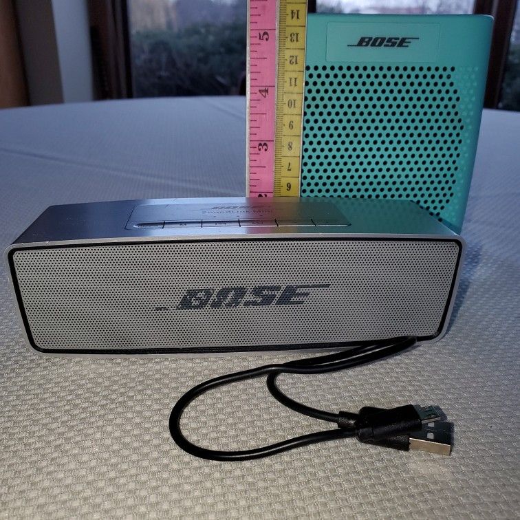 Two Bose SoundLink Speakers Bluetooth One Agua Blue Portable Speaker  One Gray Mini Speaker 