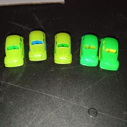 Here are a lot of 5 Light Green small Volkswagen Beetle made by Pez in Italy.