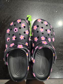 Size 8W black with flower Crocs