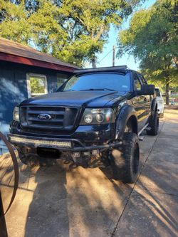 Black ford pickup truck