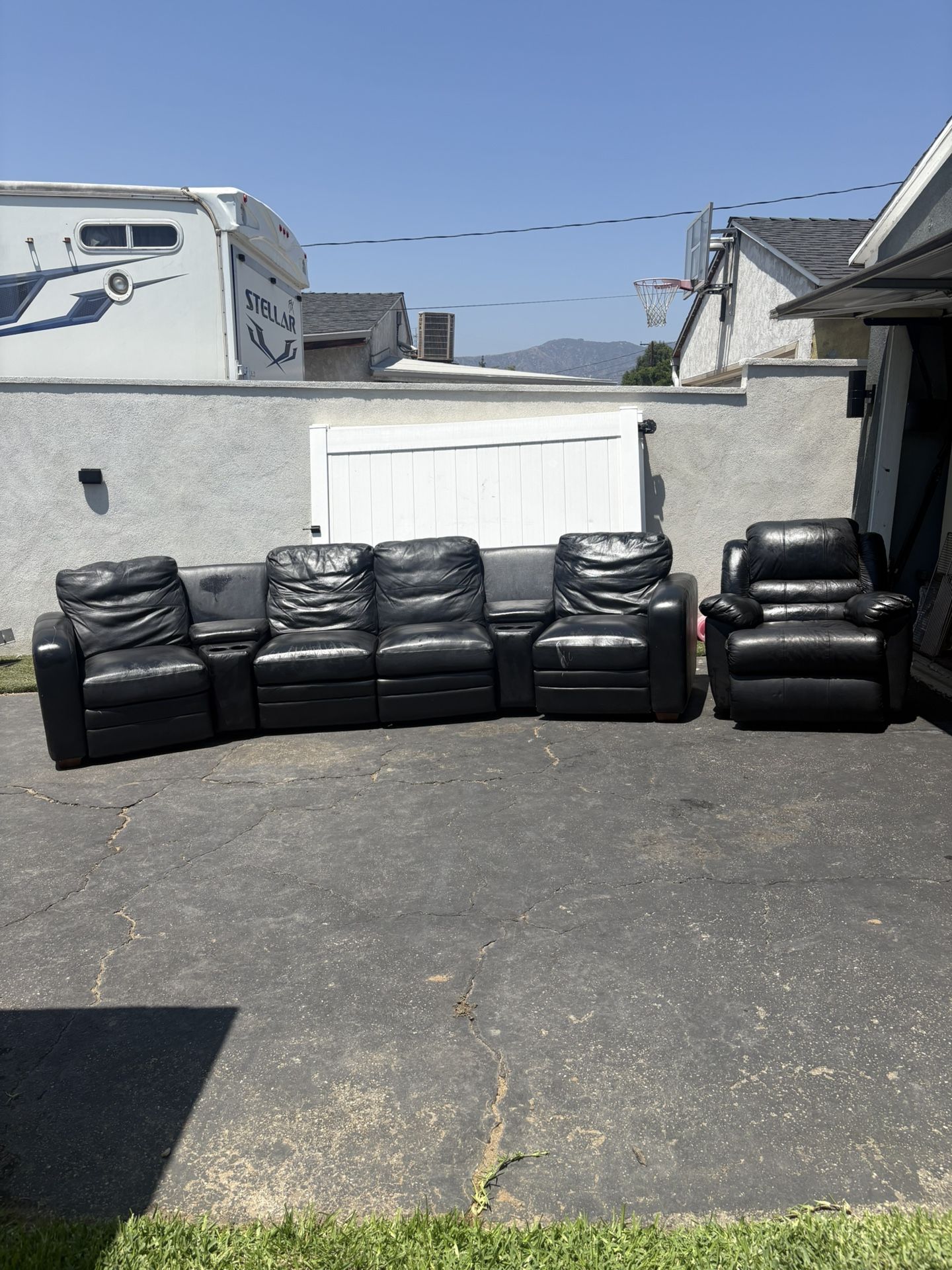 7 Year Old Black leather Couch Set- Seats 5 And All Recline