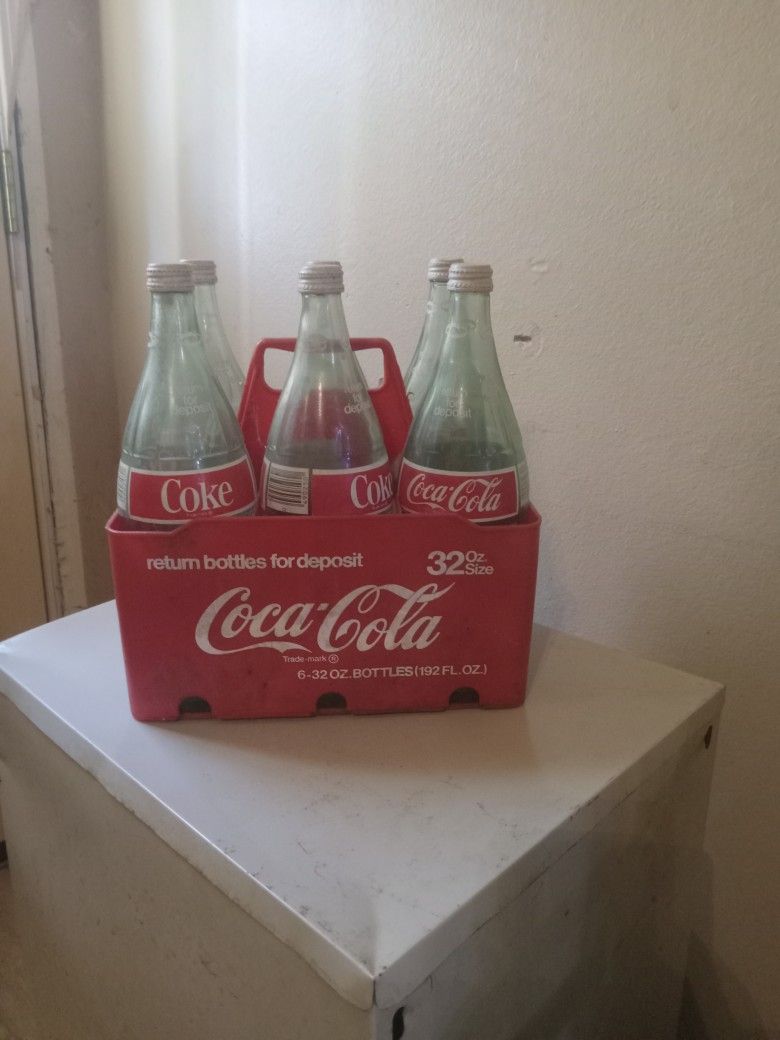 Antique Coke bottles. Good shape.