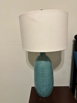 Teal colored table lamp